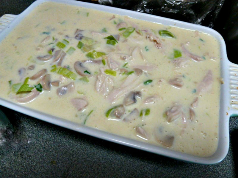 Chicken pie filling in dish before topping is added