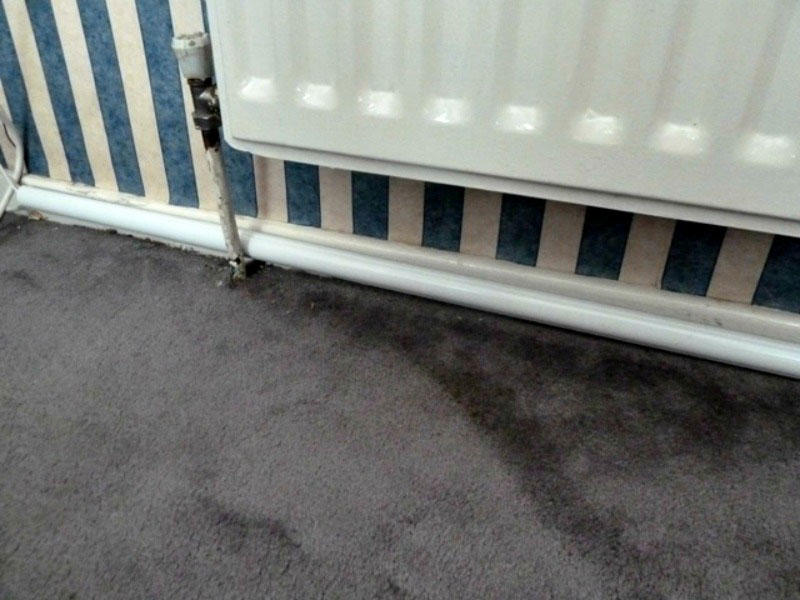 cables under radiator cleared away with cable tidies