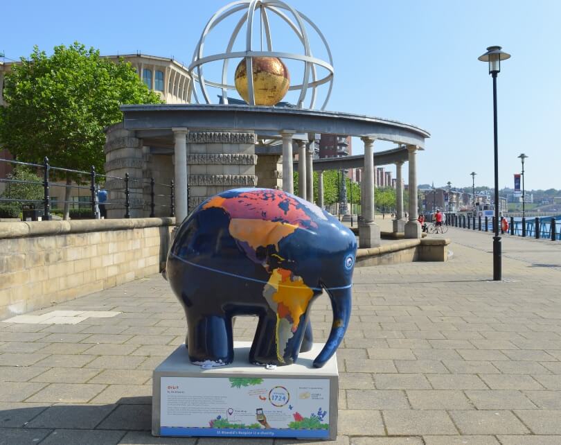 Elmer the elephant decorated with a world map
