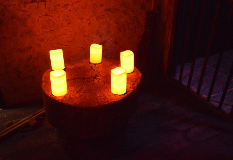 Candles burning on a table