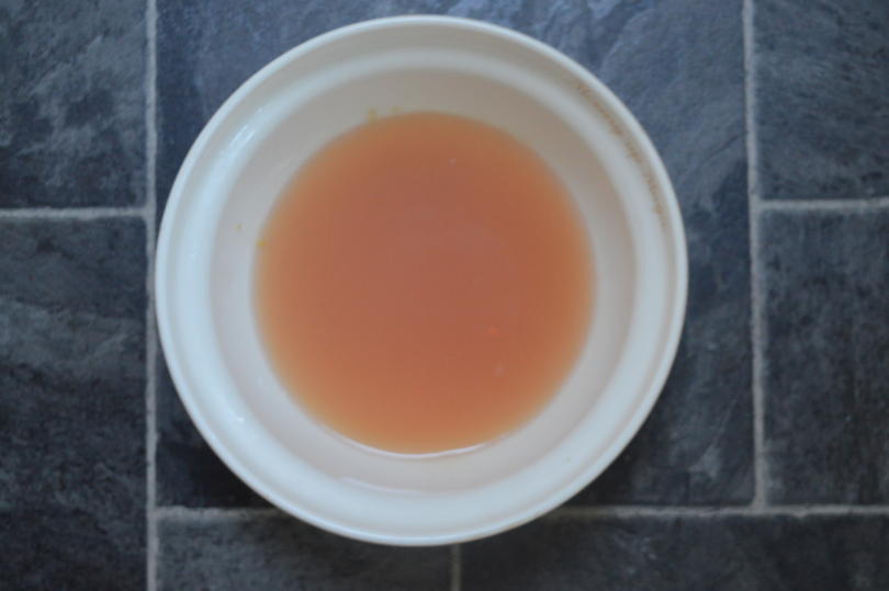 Crab apple juice in a bowl