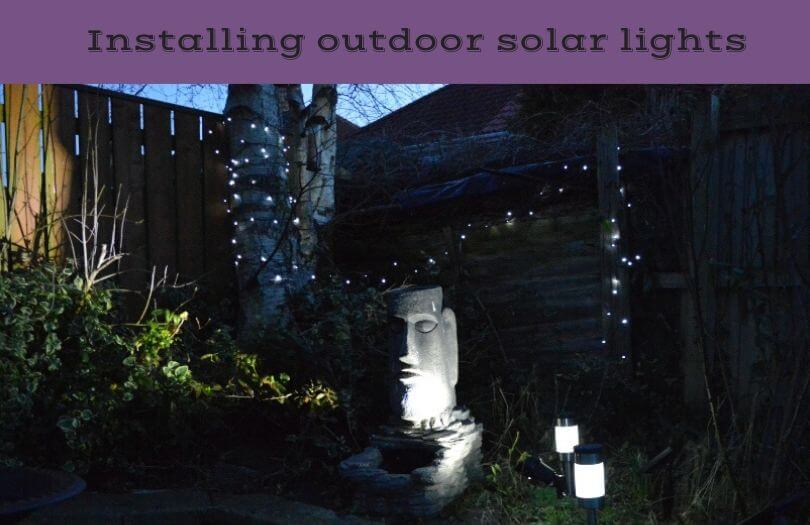 A garden with solar path lights and solar fairy lights set up