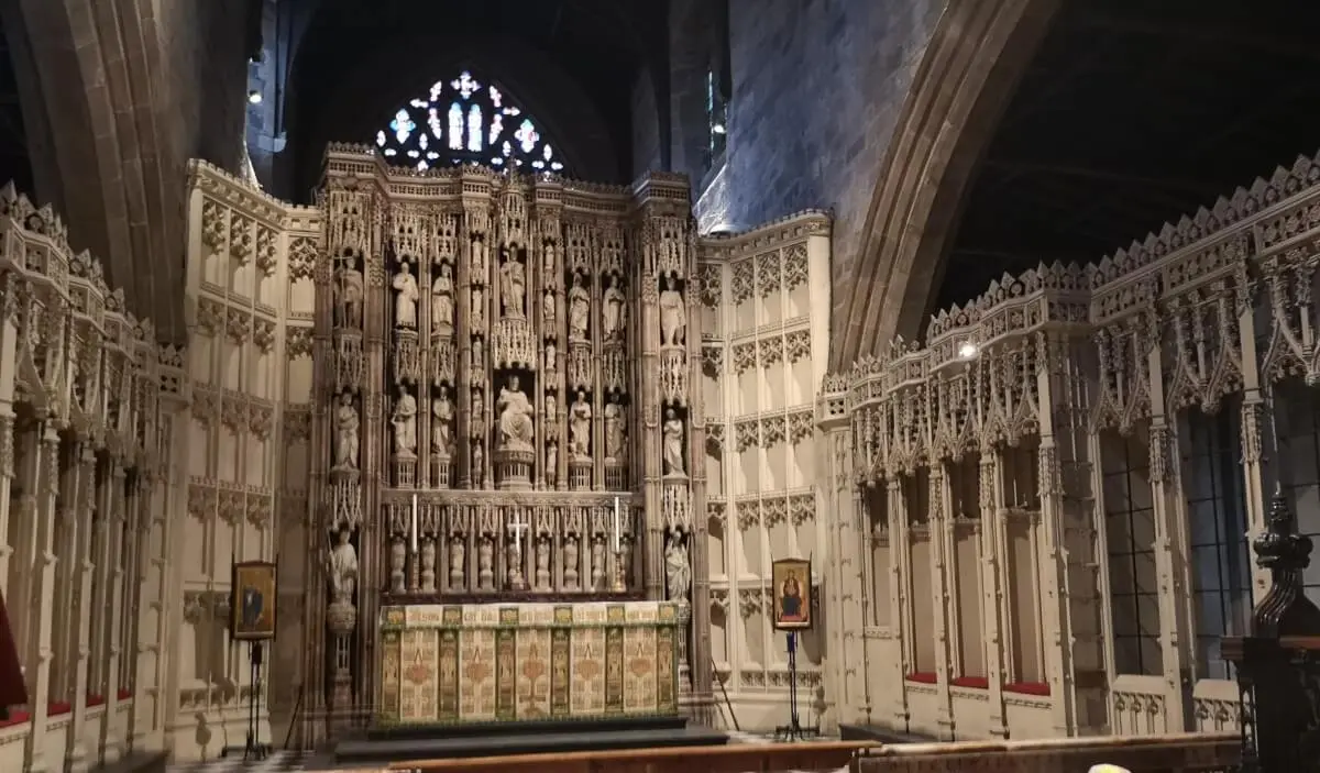 Interior of Newcastle Cathedral showing the altar and Gothic stone carvings
