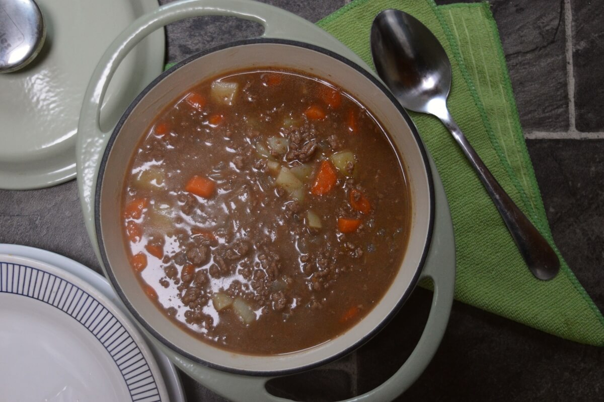 Minced beef hash in a casserole dish on a table