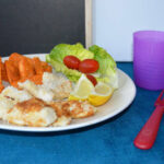 Coconut chicken with sweet potato wedges
