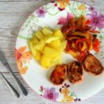 Spanish pork with sweet and sour peppers and saffron potatoes
