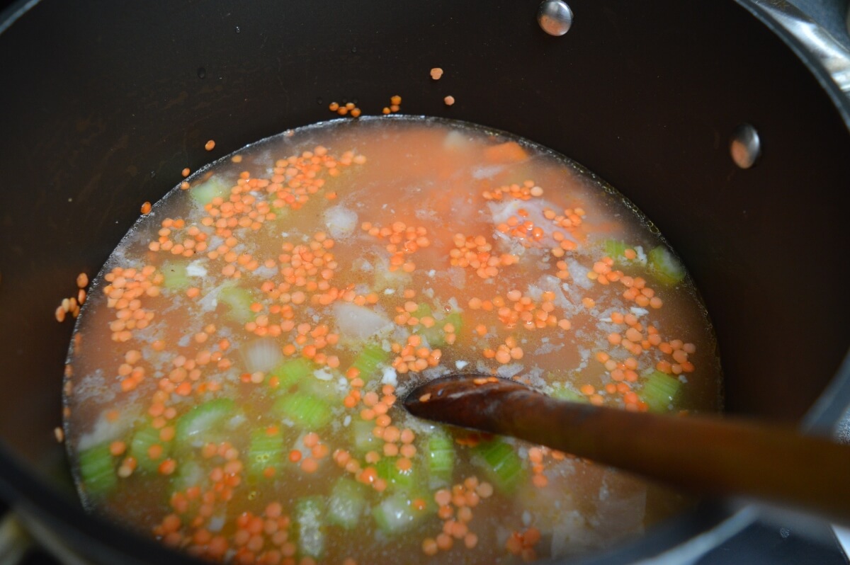 Ham stock poured into the soup