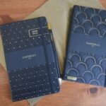 Castelli diary and notebook on a desk