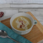 neep and tattie soup in a green bowl on a table
