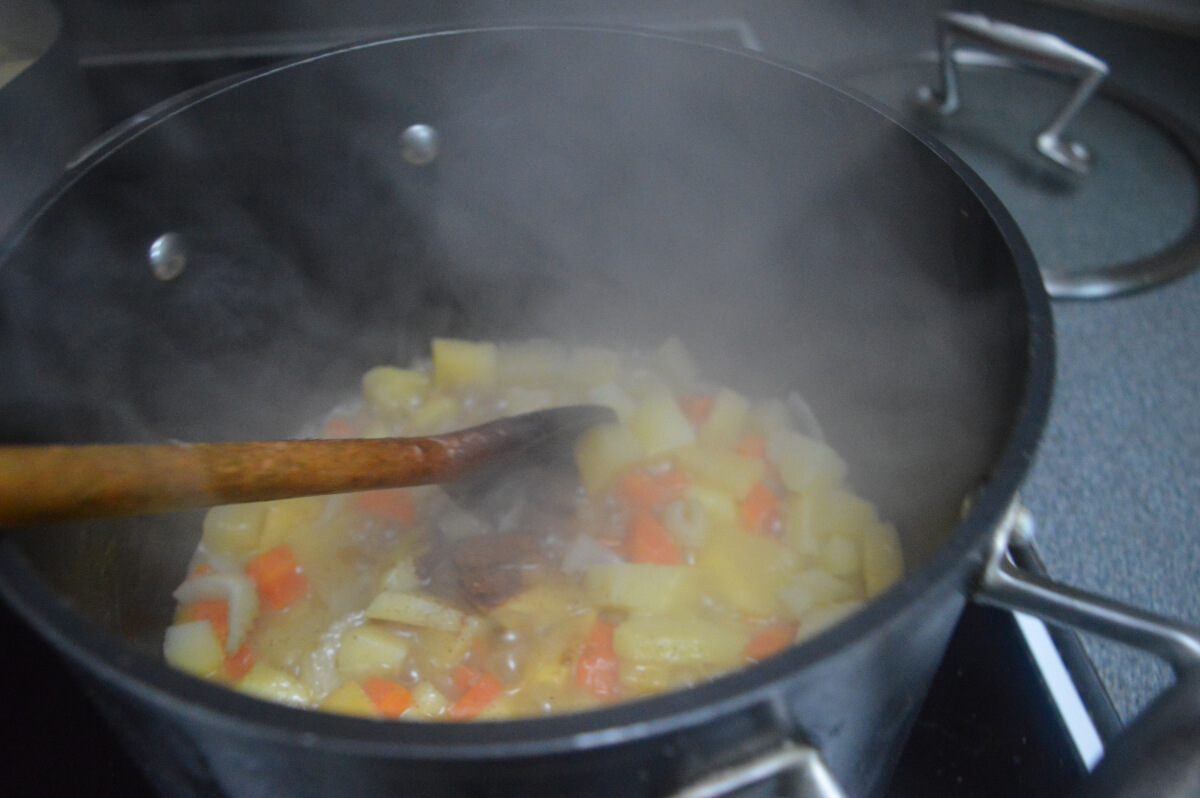 Vegetables simmering in a pan