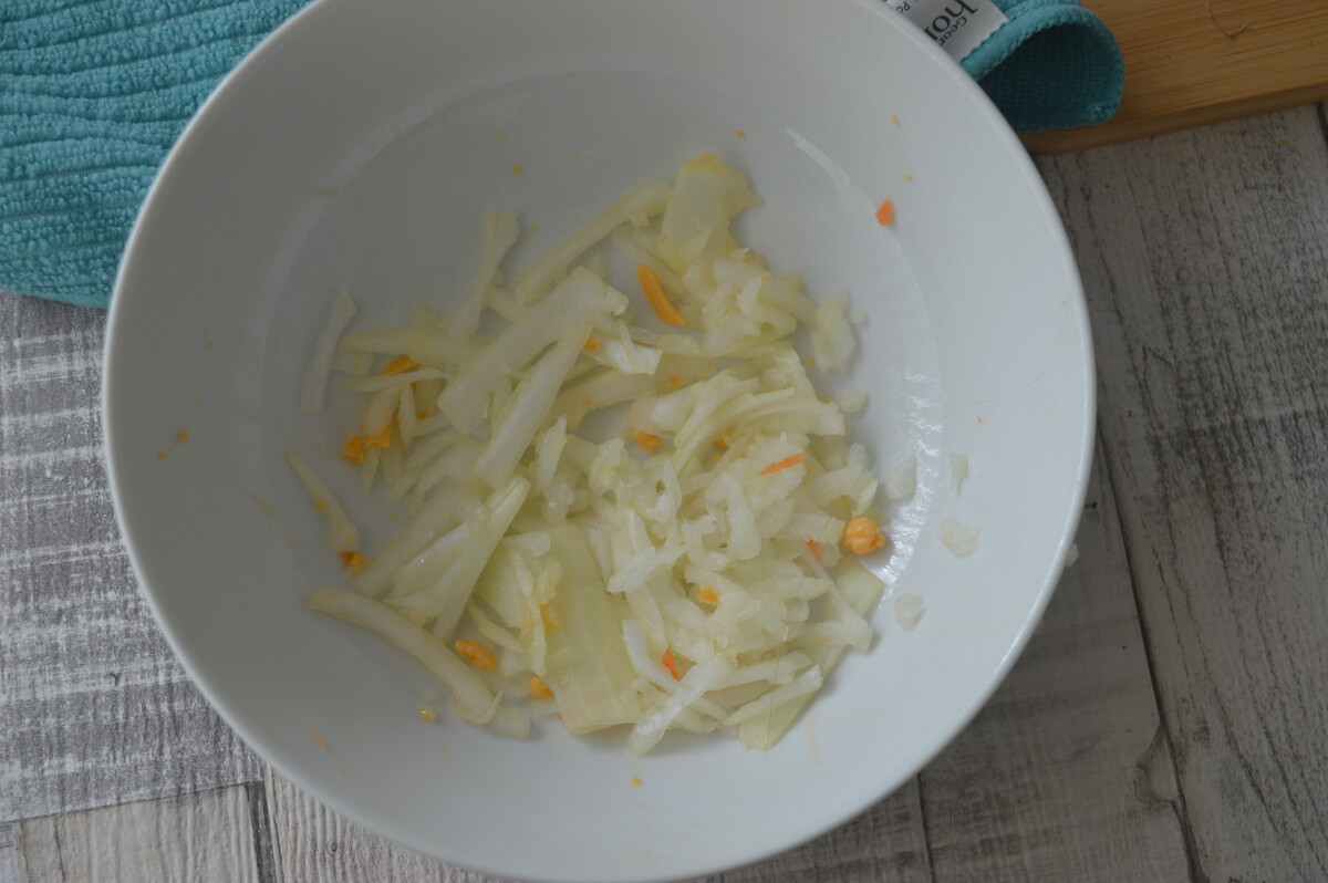 Grated onion in a bowl