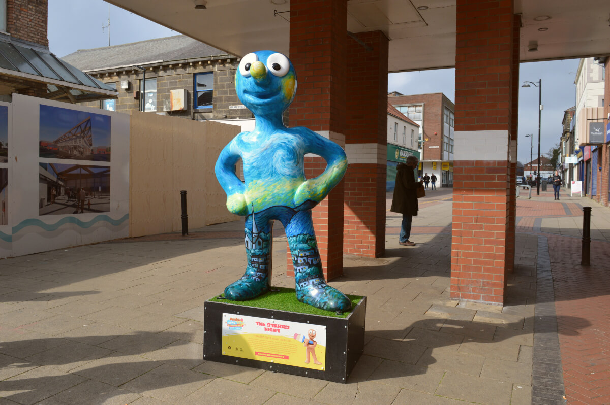Starry Night Morph outside the Beacon Centre North Shields. He has swirls of blue and yelllow inspired by the Van Gogh painting as inspriation