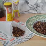 Carlin peas in a rustic bowl with malt vinegar and a pat of butter, a North East Bonfire Night classic served in paper cones