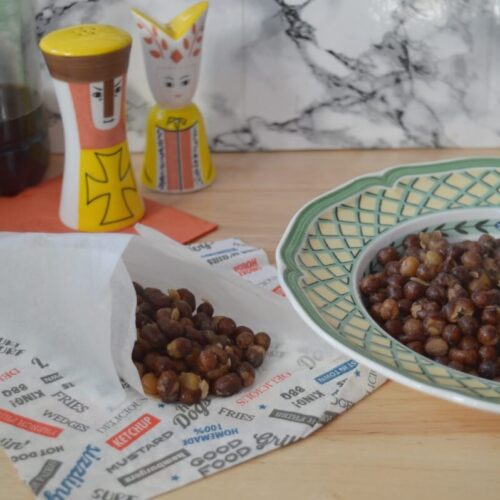 Carlin peas in a rustic bowl with malt vinegar and a pat of butter, a North East Bonfire Night classic served in paper cones