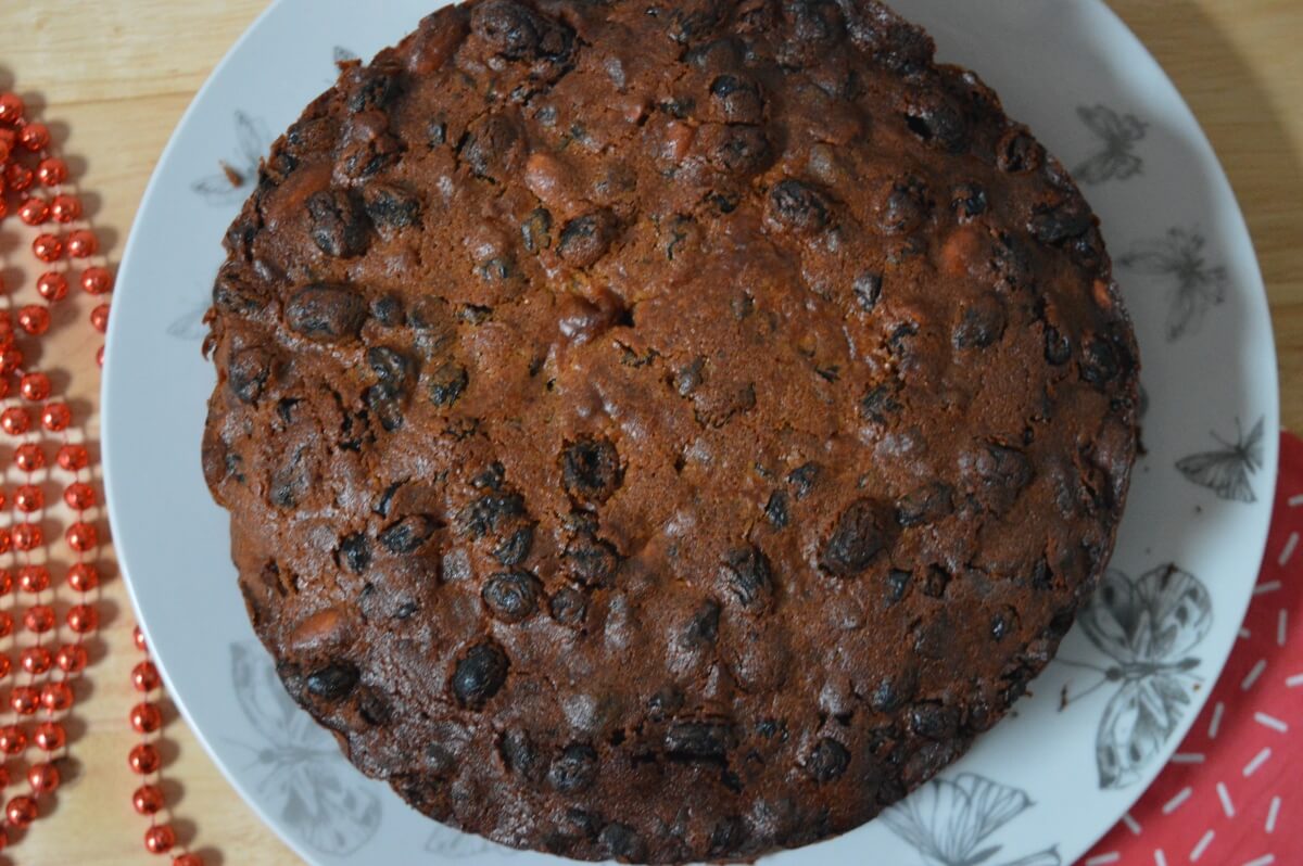 A Christmas cake on a plate, viewed from above