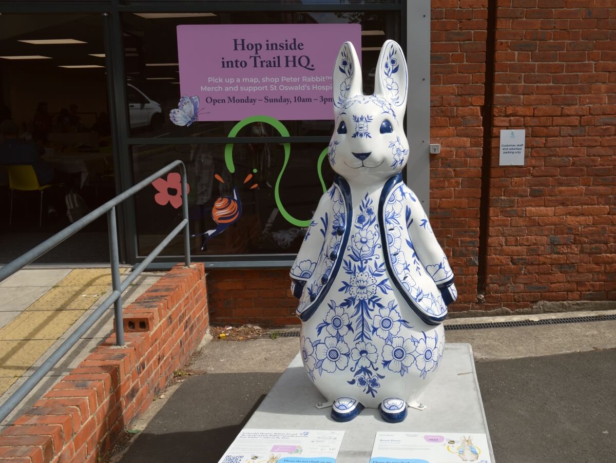 Bunny Potter blue and white Peter Rabbit sculpture outside Peter Rabbit Trail HQ in Ouseburn