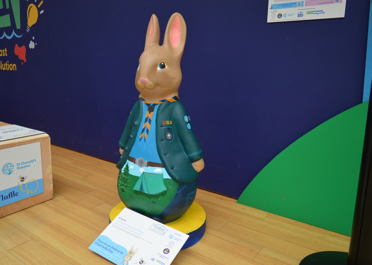 Carver Peter Rabbit with a little tent