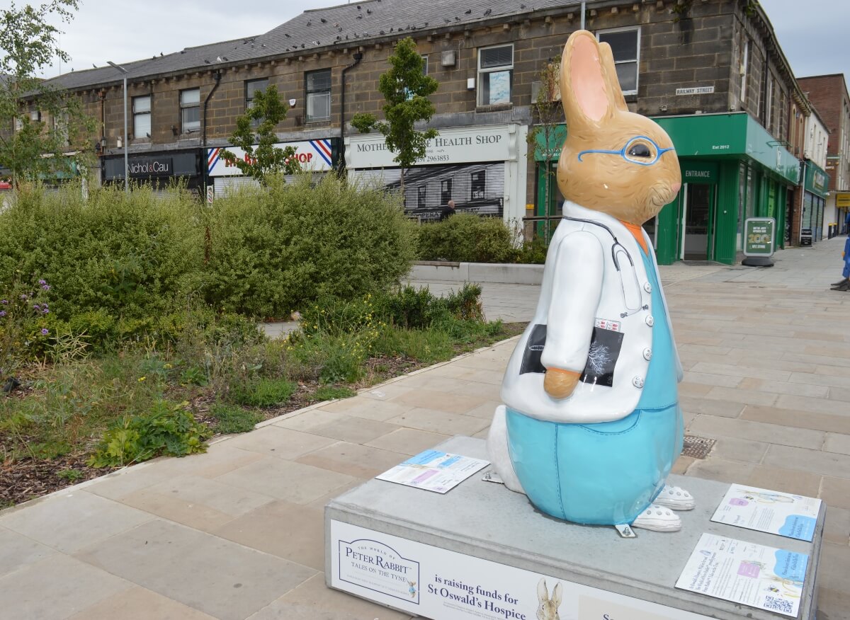 Side view of Dr Hop-well Peter Rabbit showing the X-ray detail on his doctor's coat