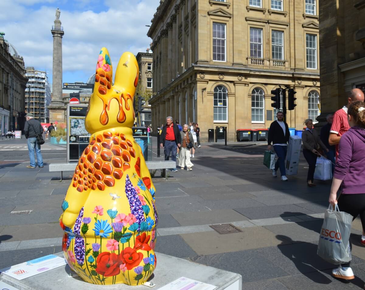 Back of Honey Bunny Peter Rabbit showing honeycomb and wildflowers near the Theatre Royal