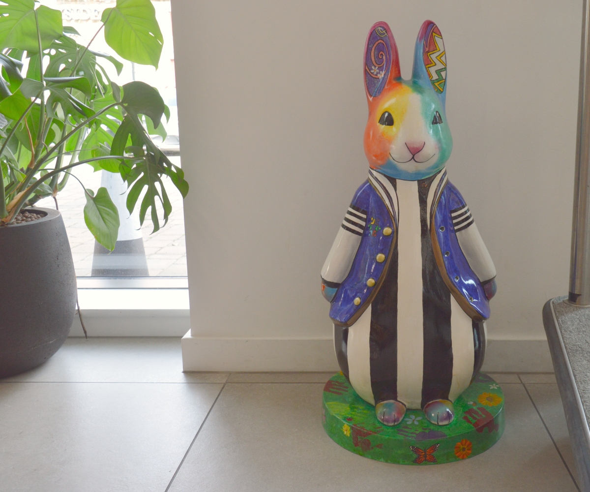 Together We Shine Peter Rabbit with a colourful face and striped design