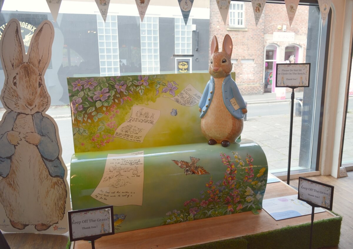 A Love Letter to the British Countryside Peter Rabbit book bench outside Seven Stories in Ouseburn