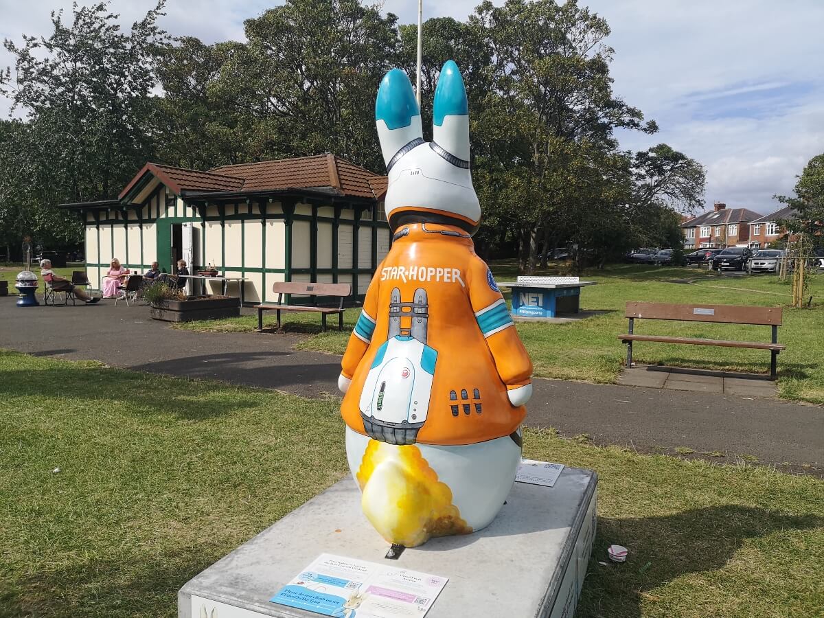 Back of Star-Hopper Peter Rabbit showing his rocket pack and fiery trail