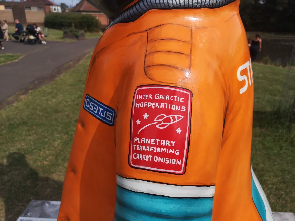 Inter-galactic Hopperations and Planetary Terraforming Carrot Division badges on Star-Hopper
