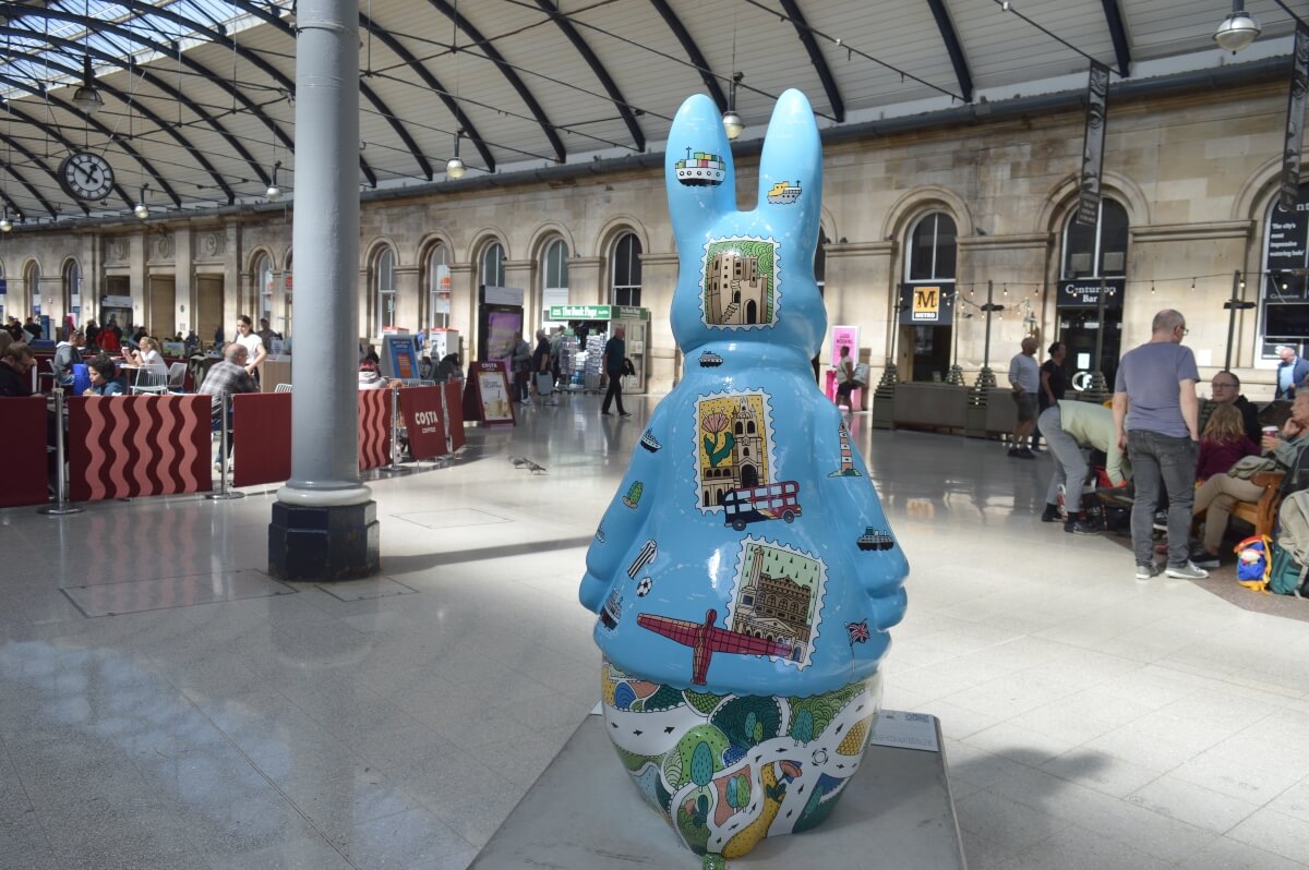 Back of Walk the Map Peter Rabbit sculpture inside Newcastle Central Station